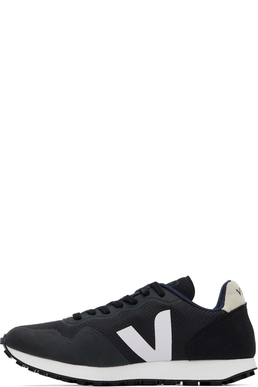 Low-top recycled B-Mesh and faux-suede sneakers in black.

· Bonded trim throughout 
· Lace-up closure
· Logo embossed at padded tongue
· Padded collar
· Logo bonded at sides
· Logo printed at heel tab
· Recycled polyester jersey lining
· Treaded rubber sole

Supplier color: Black/White
