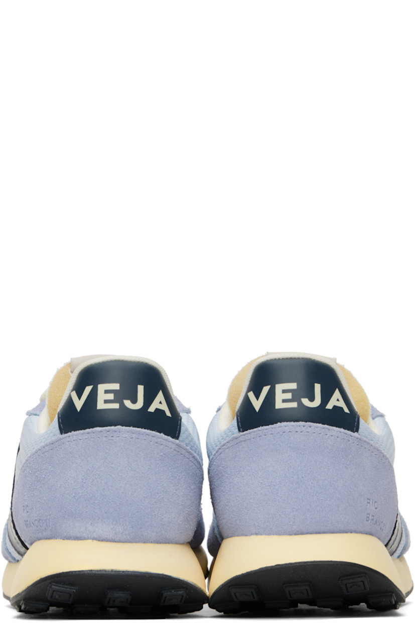 Low-top recycled Alveomesh, suede, and buffed leather sneakers in blue.

· Lace-up closure
· Logo patch at padded tongue
· Padded collar
· Logo appliqué at sides
· Text embossed at outer side
· Logo printed at heel tab
· Recycled polyester jersey lining
· Treaded rubber sole

Supplier color: Swan/Nautico