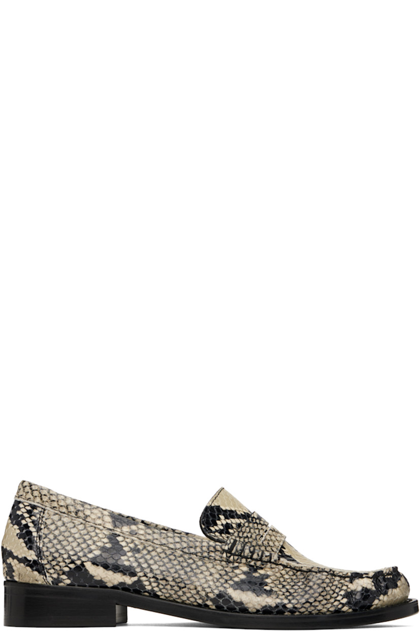 Snake-embossed calfskin loafers in beige and black.

· Moc toe
· Strap with cutout at vamp
· Buffed leather lining
· Stacked leather heel with rubber injection
· Leather sole
· Heel: H1"

Supplier color: Naturale