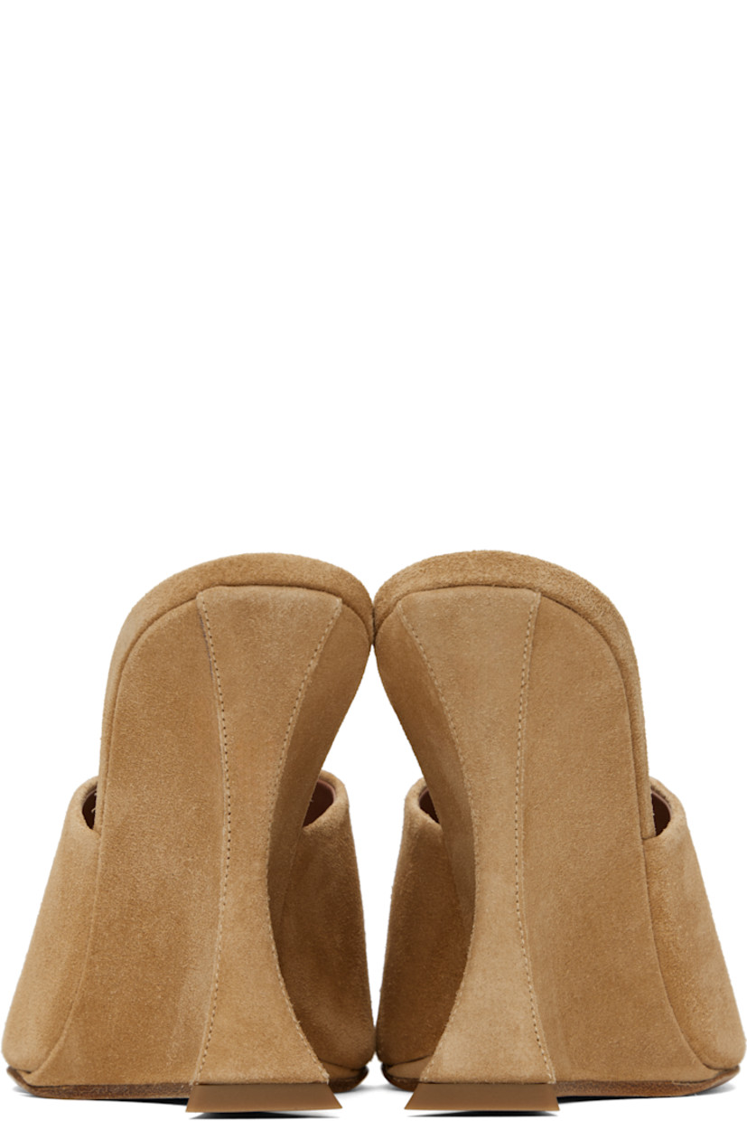 Calfskin suede mules in tan. 

· Open toe
· Logo stamp at leather footbed
· Covered wedge heel with rubber injection
· Leather sole
· Heel: H4"

Supplier color: Whisky
