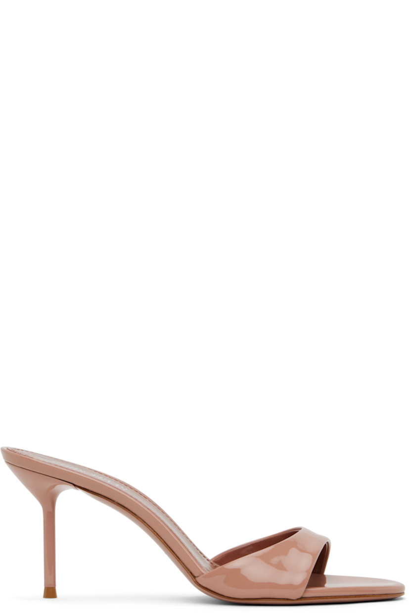 Patent leather mules in pink.

· Open toe
· Logo stamp at padded footbed
· Lacquered stiletto heel with rubber injection
· Leather sole
· Heel: H3"

Supplier color: Dark blush