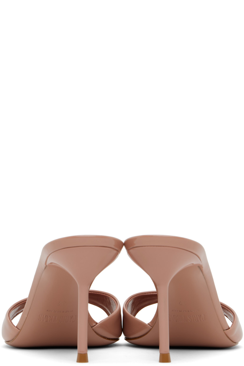 Patent leather mules in pink.

· Open toe
· Logo stamp at padded footbed
· Lacquered stiletto heel with rubber injection
· Leather sole
· Heel: H3"

Supplier color: Dark blush
