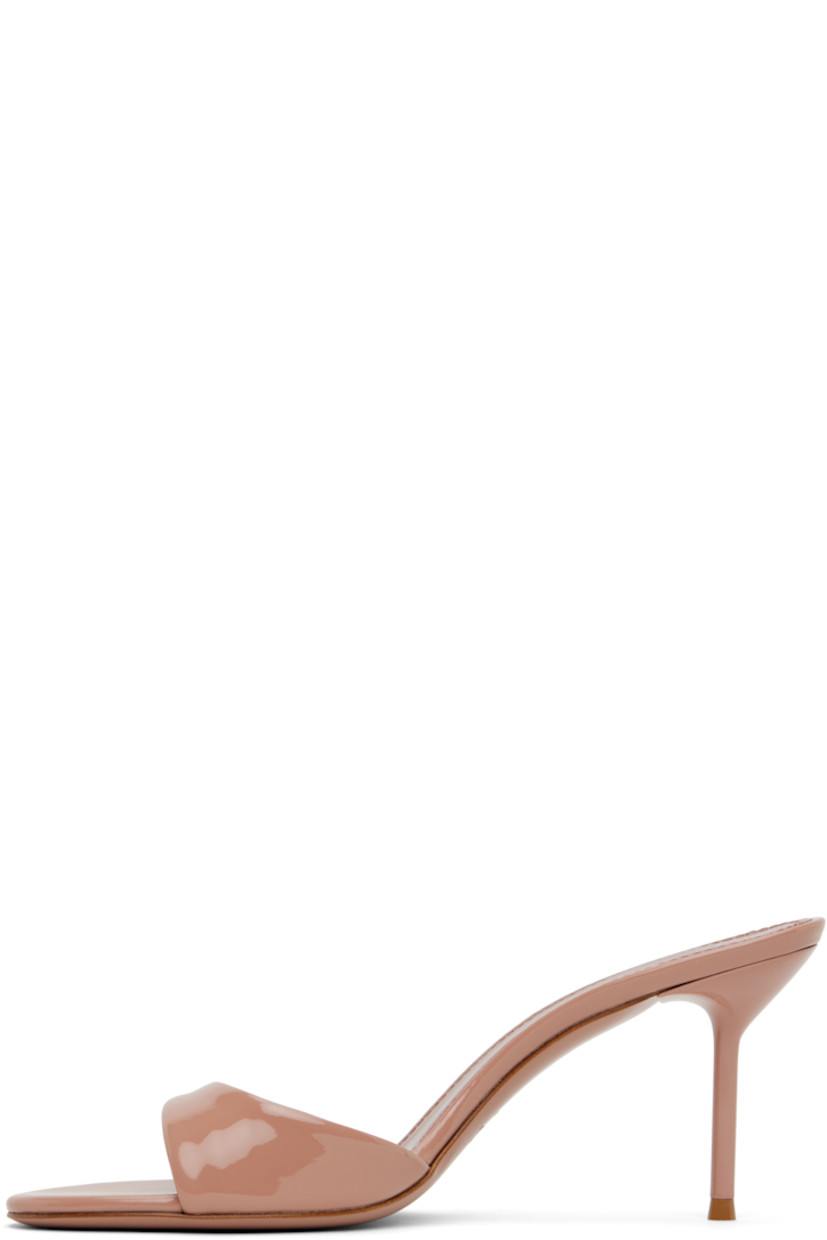 Patent leather mules in pink.

· Open toe
· Logo stamp at padded footbed
· Lacquered stiletto heel with rubber injection
· Leather sole
· Heel: H3"

Supplier color: Dark blush