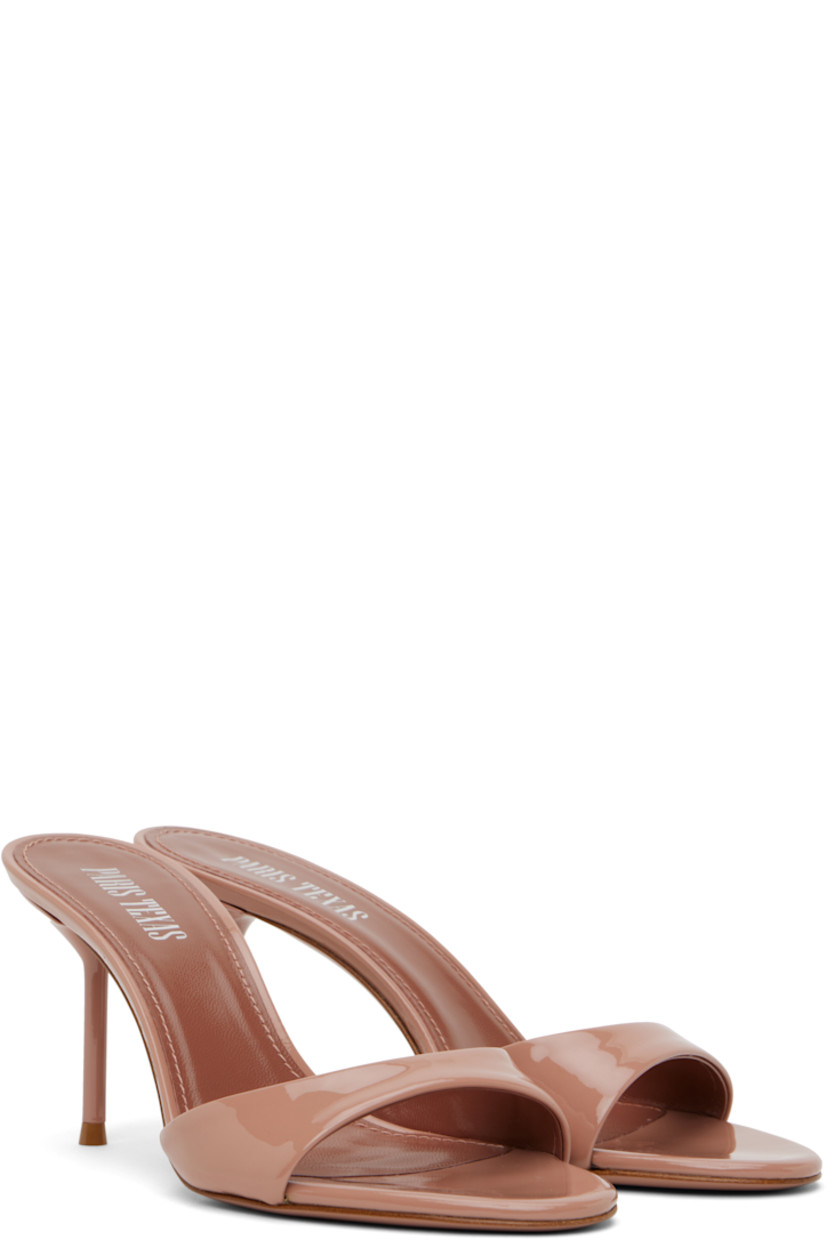 Patent leather mules in pink.

· Open toe
· Logo stamp at padded footbed
· Lacquered stiletto heel with rubber injection
· Leather sole
· Heel: H3"

Supplier color: Dark blush