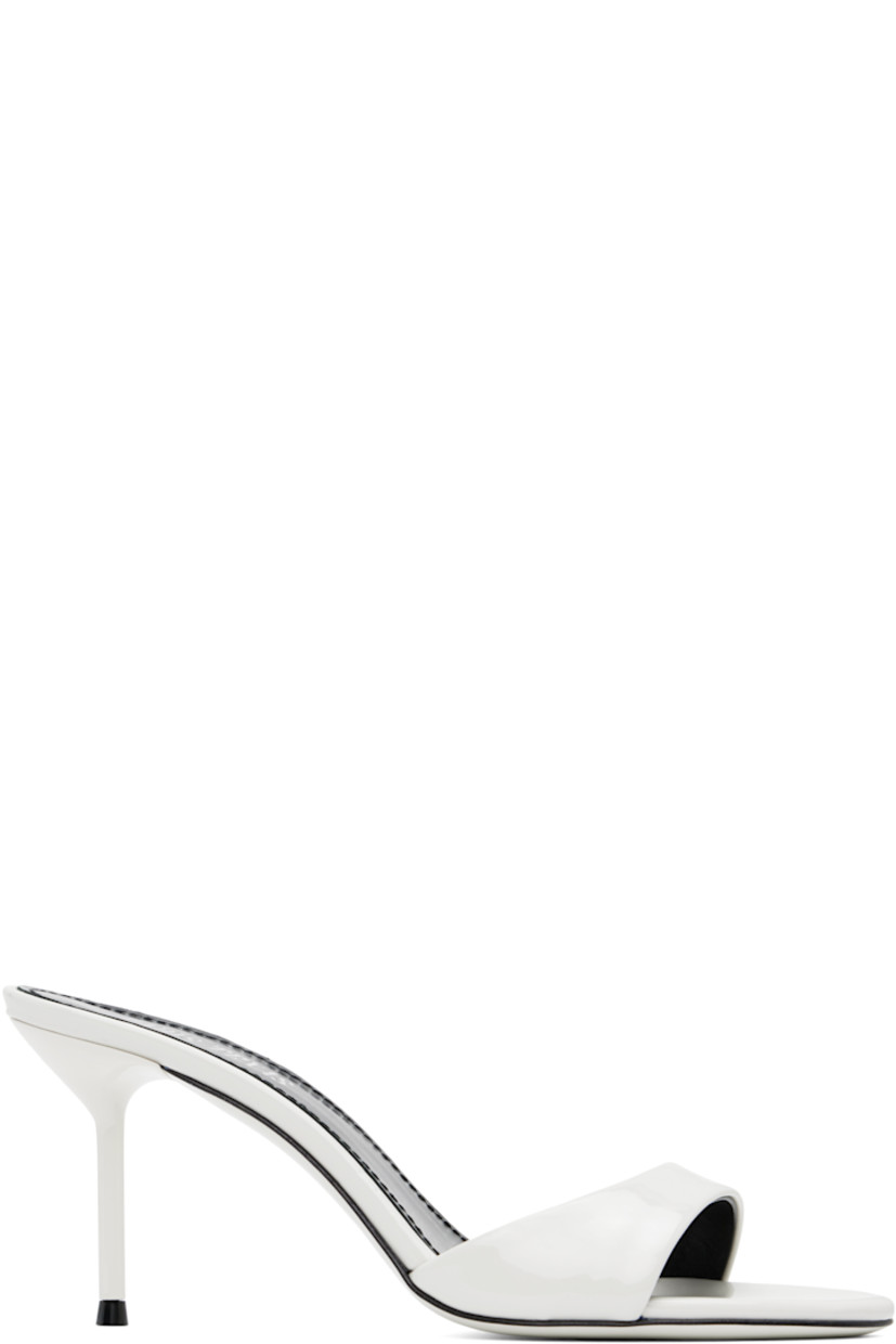 Patent leather mules in white.

· Open toe
· Strap at vamp
· Logo stamp at padded leather footbed
· Metal stiletto heel with rubber injection
· Patent leather sole
· Heel: H3"

Supplier color: White