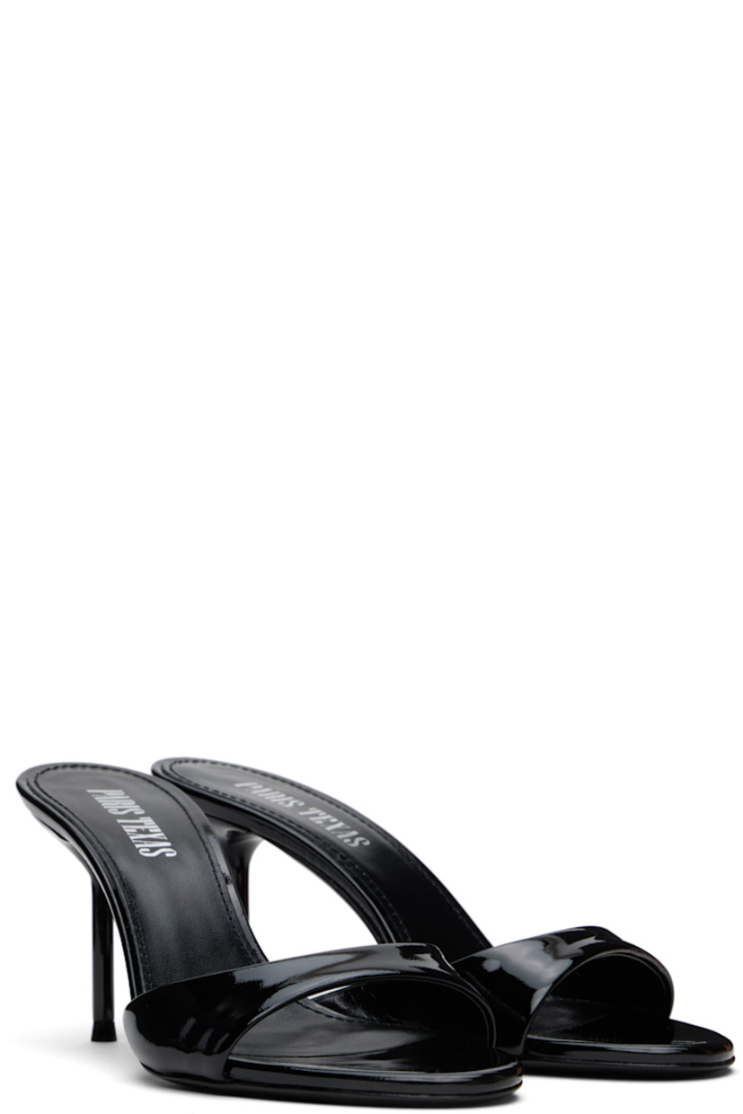 Patent leather mules in black.

· Open toe
· Logo stamp at padded footbed
· Lacquered stiletto heel with rubber injection
· Leather sole
· Heel: H3"

Supplier color: Black