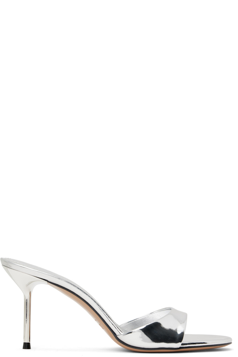 Patent leather mules in metallic silver tone.

· Open toe
· Logo stamp at padded leather footbed
· Lacquered stiletto heel with rubber injection
· Leather sole
· Heel: H3"

Supplier color: Silver
