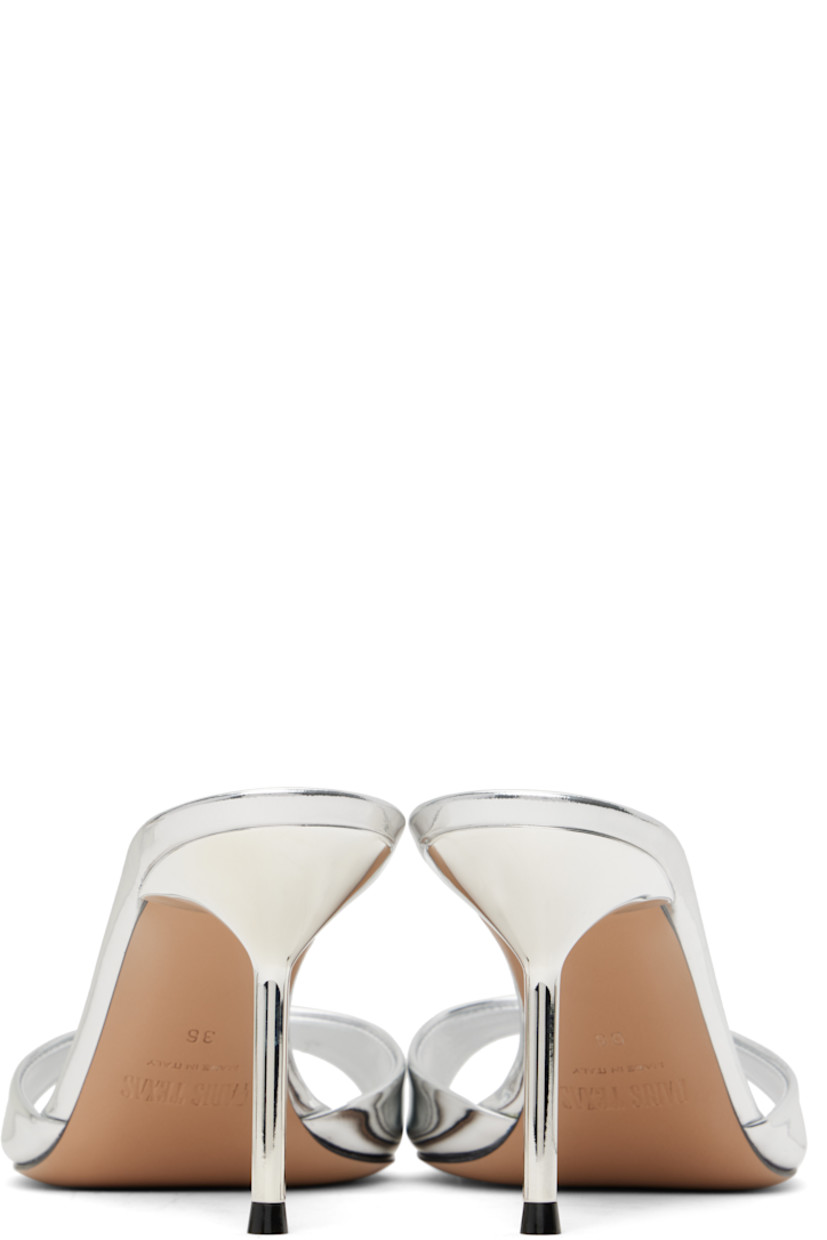 Patent leather mules in metallic silver tone.

· Open toe
· Logo stamp at padded leather footbed
· Lacquered stiletto heel with rubber injection
· Leather sole
· Heel: H3"

Supplier color: Silver