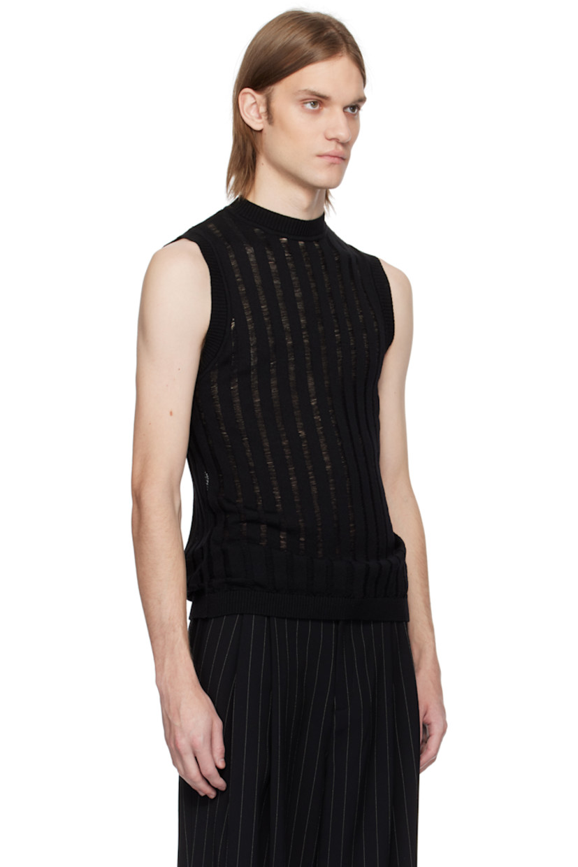 Rib-knit extrafine merino wool tank top. 

· Laddering throughout 
· Crewneck

Supplier color: Black