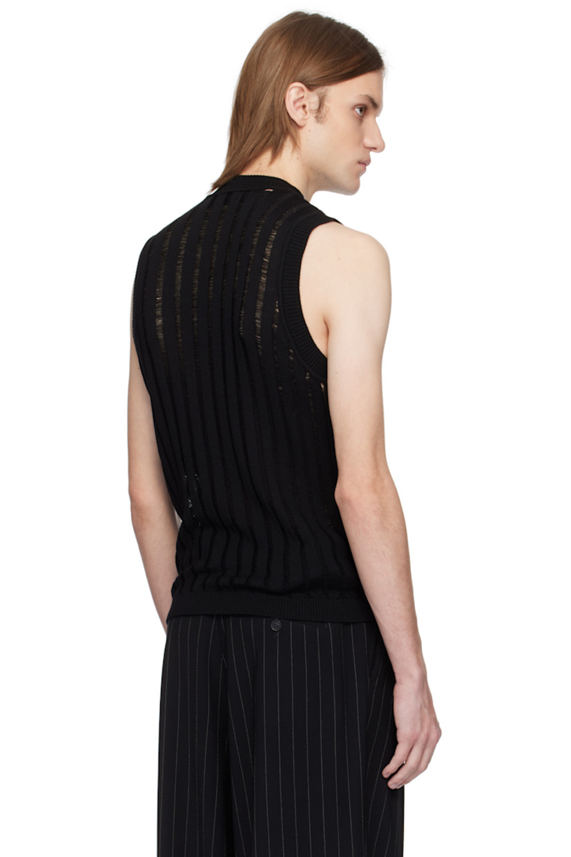 Rib-knit extrafine merino wool tank top. 

· Laddering throughout 
· Crewneck

Supplier color: Black