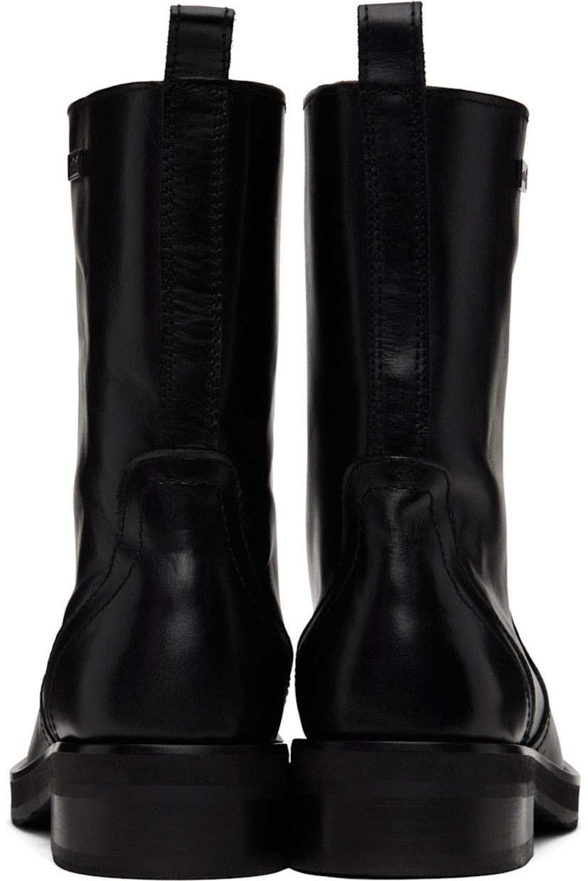 Mid-calf chrome-free LWG-certified polished leather boots in black.

· Square-toe
· Pull-loop at heel collar
· Logo plaque at outer side
· Grained leather lining
· Stacked leather heel with rubber injection
· Treaded rubber sole

Supplier color: Black