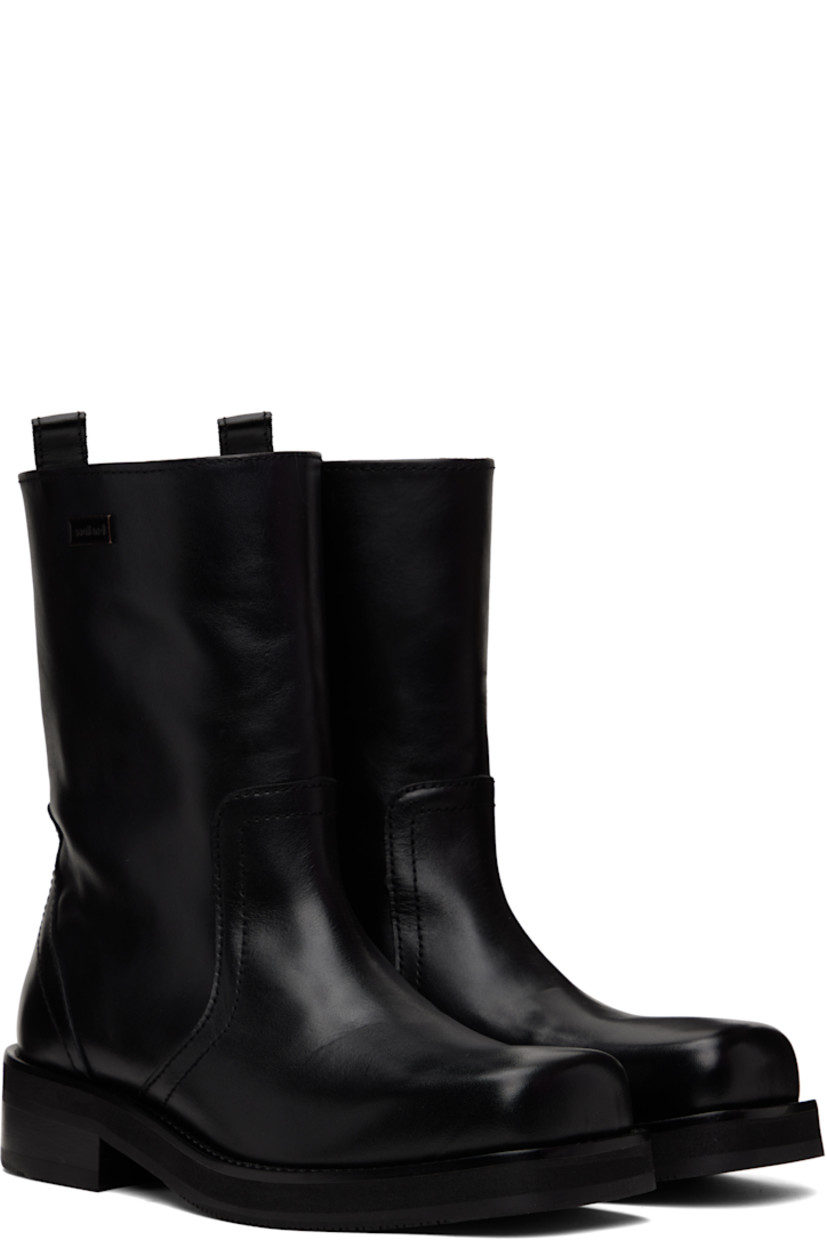 Mid-calf chrome-free LWG-certified polished leather boots in black.

· Square-toe
· Pull-loop at heel collar
· Logo plaque at outer side
· Grained leather lining
· Stacked leather heel with rubber injection
· Treaded rubber sole

Supplier color: Black