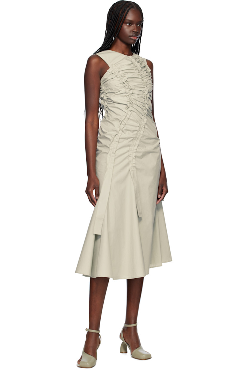 Cotton poplin midi dress. Ruching with scalloped edges throughout.

· Asymmetrical construction
· V-neck
· Concealed zip closure at back

Supplier color: Grey