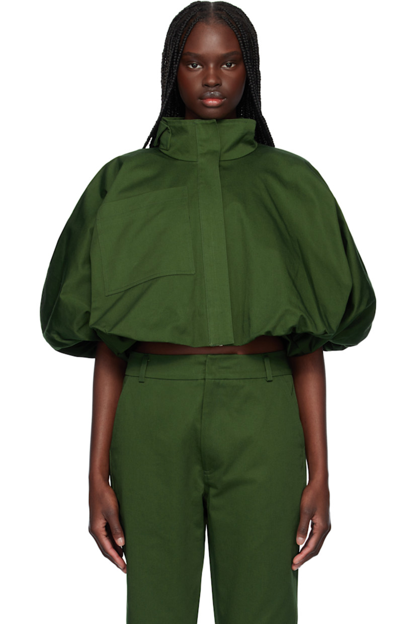 Hand-dyed cotton gabardine bomber jacket. 

· Button tab at stand collar
· Concealed zip closure
· Patch pocket at chest
· Gathering at elasticized cropped bubble hem
· Cap sleeves with inset elasticized cuffs
· Full plain-woven lining

Supplier color: Green