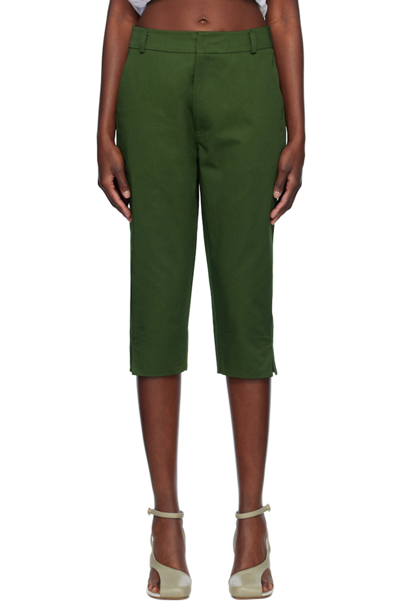 Cotton gabardine trousers. 

· Belt loops
· Two-pocket styling 
· Zip fly
· Cropped legs
· Vented cuffs
· Curved outseams

Supplier color: Green