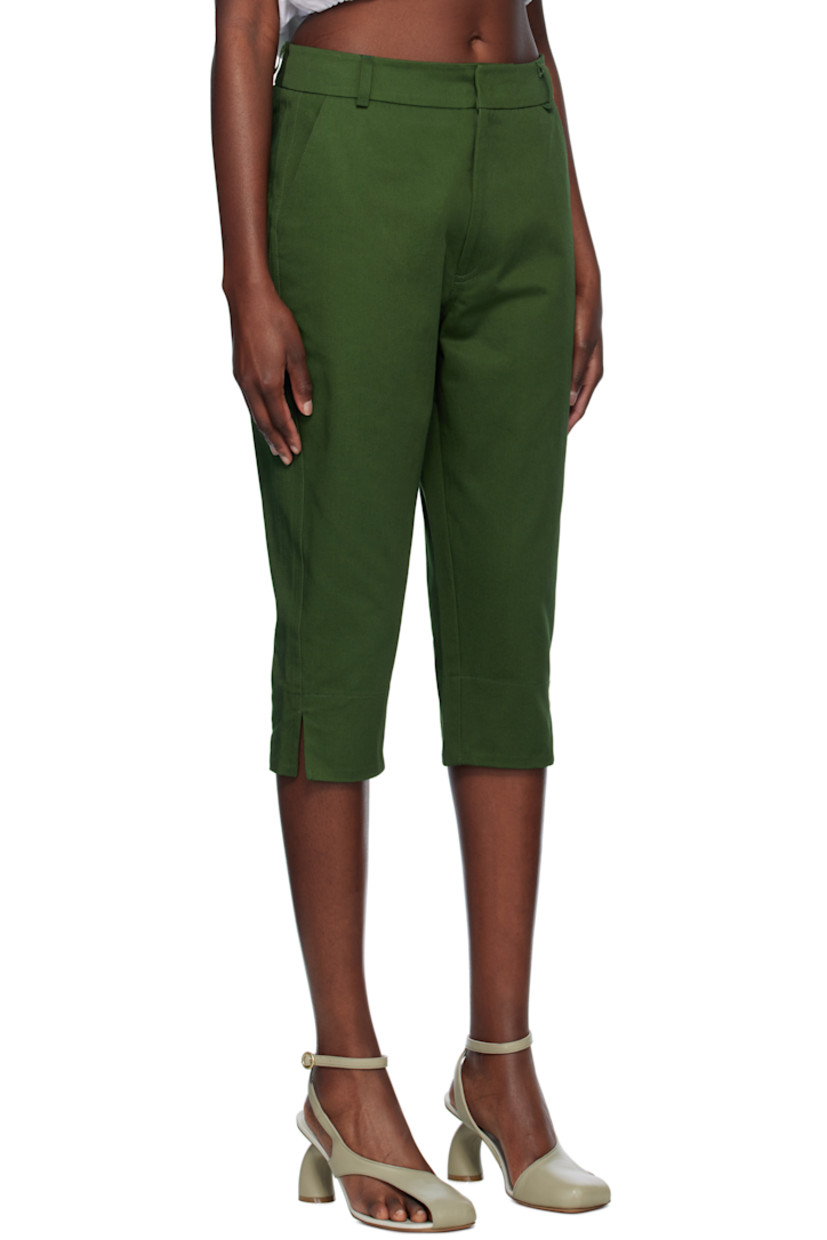 Cotton gabardine trousers. 

· Belt loops
· Two-pocket styling 
· Zip fly
· Cropped legs
· Vented cuffs
· Curved outseams

Supplier color: Green