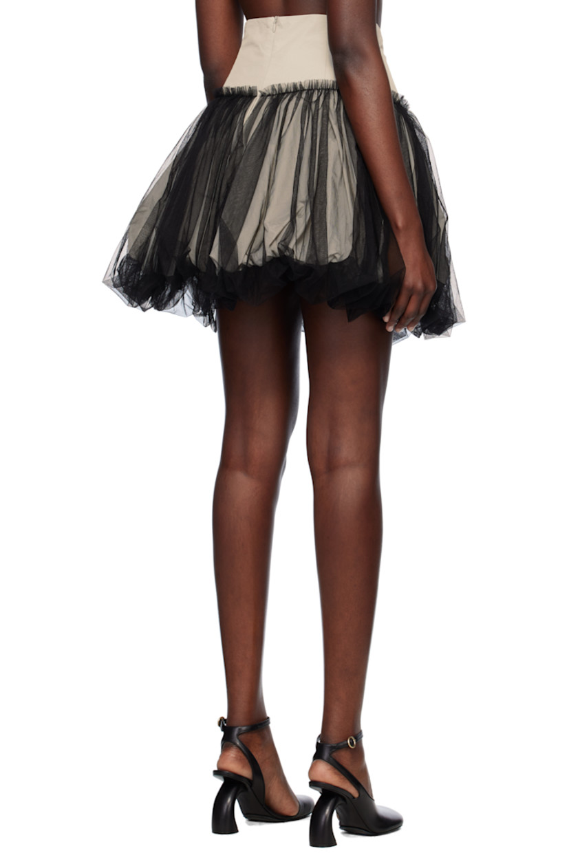 Polyester taffeta miniskirt. Sheer tulle overlay.

· Layered construction
· Bubble hem 
· Concealed zip closure at back

Supplier color: Grey