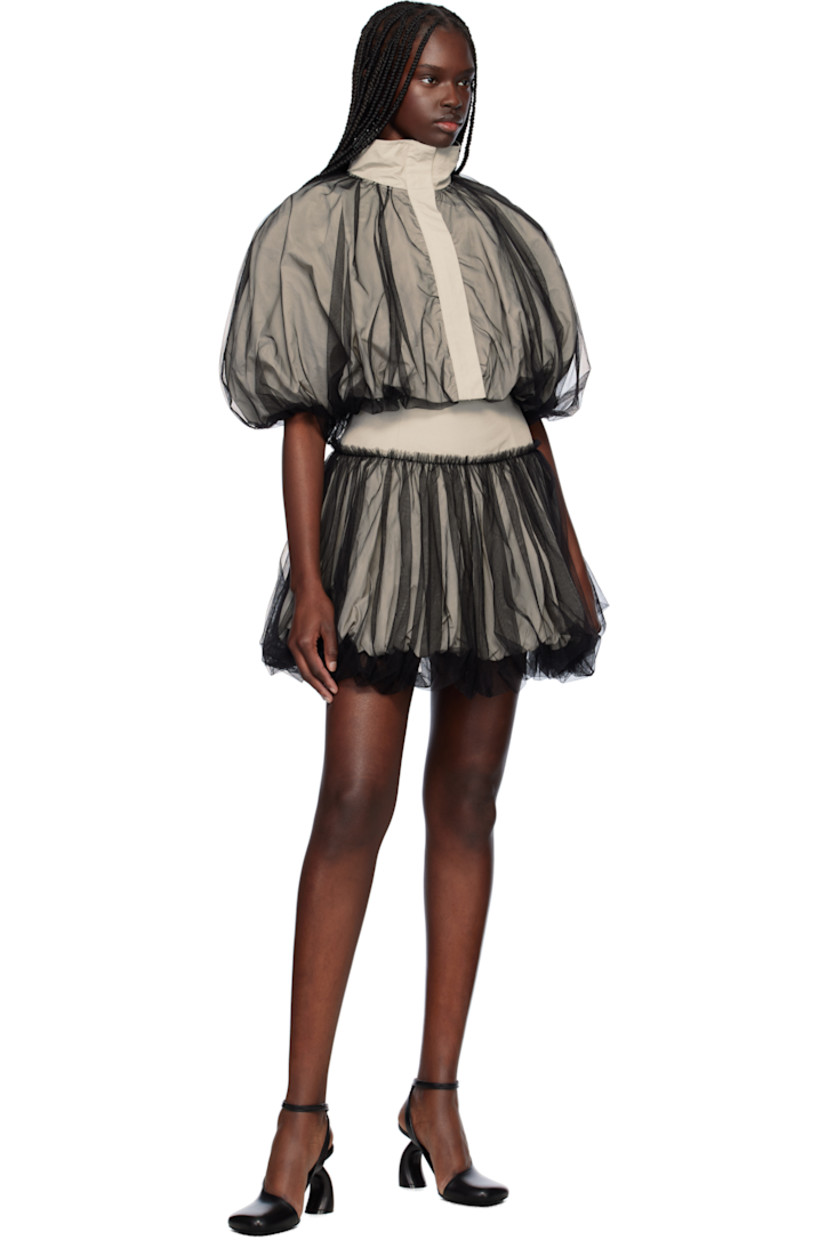 Polyester taffeta miniskirt. Sheer tulle overlay.

· Layered construction
· Bubble hem 
· Concealed zip closure at back

Supplier color: Grey
