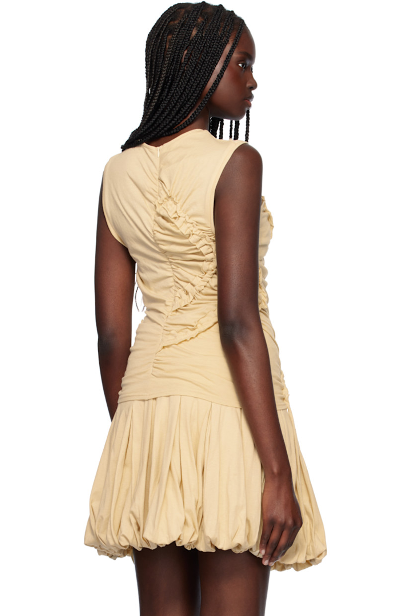 Cotton jersey top. Ruching and scalloped raw edges throughout.

· Asymmetrical construction
· Rib-knit V-neck and armscyes
· Extended straps at hem
· Concealed zip closure at back

Supplier color: Beige