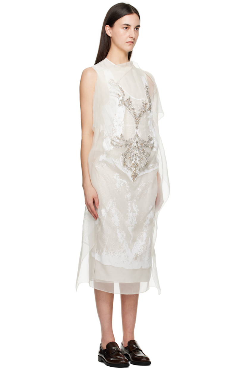 Silk organza midi dress.

· Layered and asymmetrical construction
· Round neck
· Printed pattern and crystal-cut accents at front
· Vented side seams
· Zip closure at back
· Fully lined

Supplier color: Elena imprint white