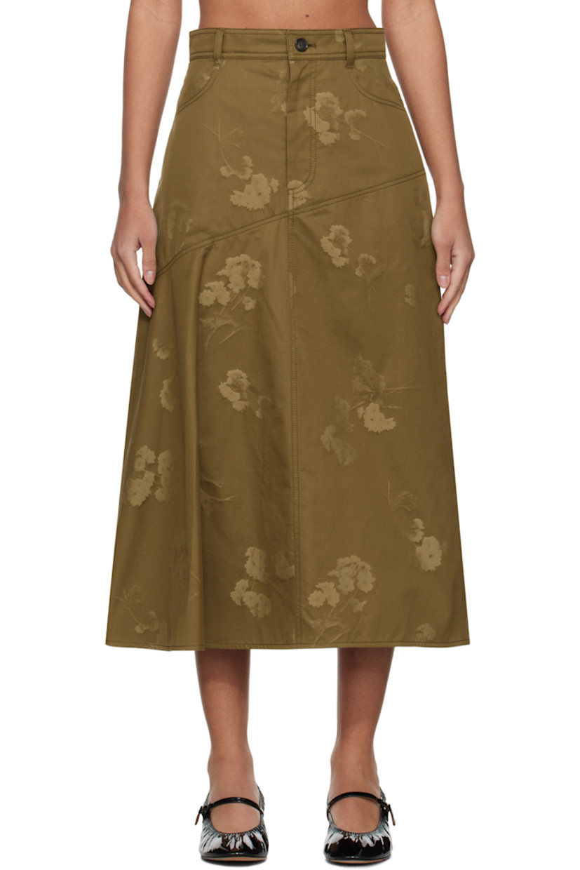 Cotton twill midi skirt. Jacquard floral pattern throughout.

· Paneled construction 
· Belt loops
· Two-pocket styling
· Zip-fly
· Asymmetric hem 
· Draping at side seam

Supplier color: Khaki