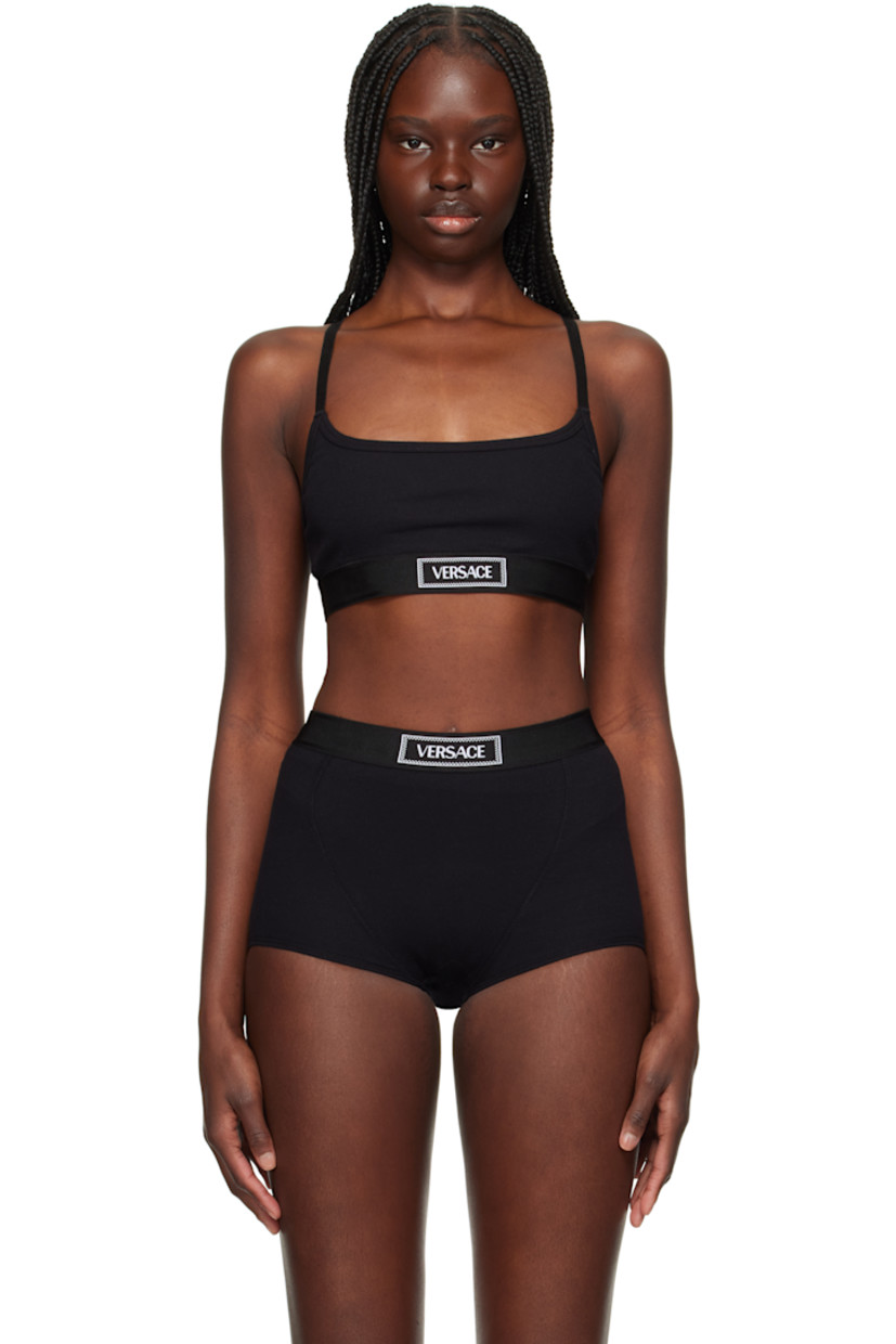 Stretch organic cotton ribbed jersey bra. 

· Scoop neck
· Jacquard logo at elasticized hem
· Logo-woven adjustable elasticized shoulder straps
· Fully lined 

Supplier color: Black