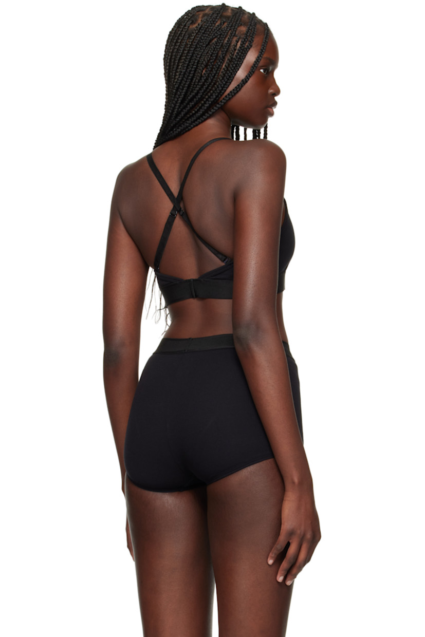 Stretch organic cotton ribbed jersey bra. 

· Scoop neck
· Jacquard logo at elasticized hem
· Logo-woven adjustable elasticized shoulder straps
· Fully lined 

Supplier color: Black