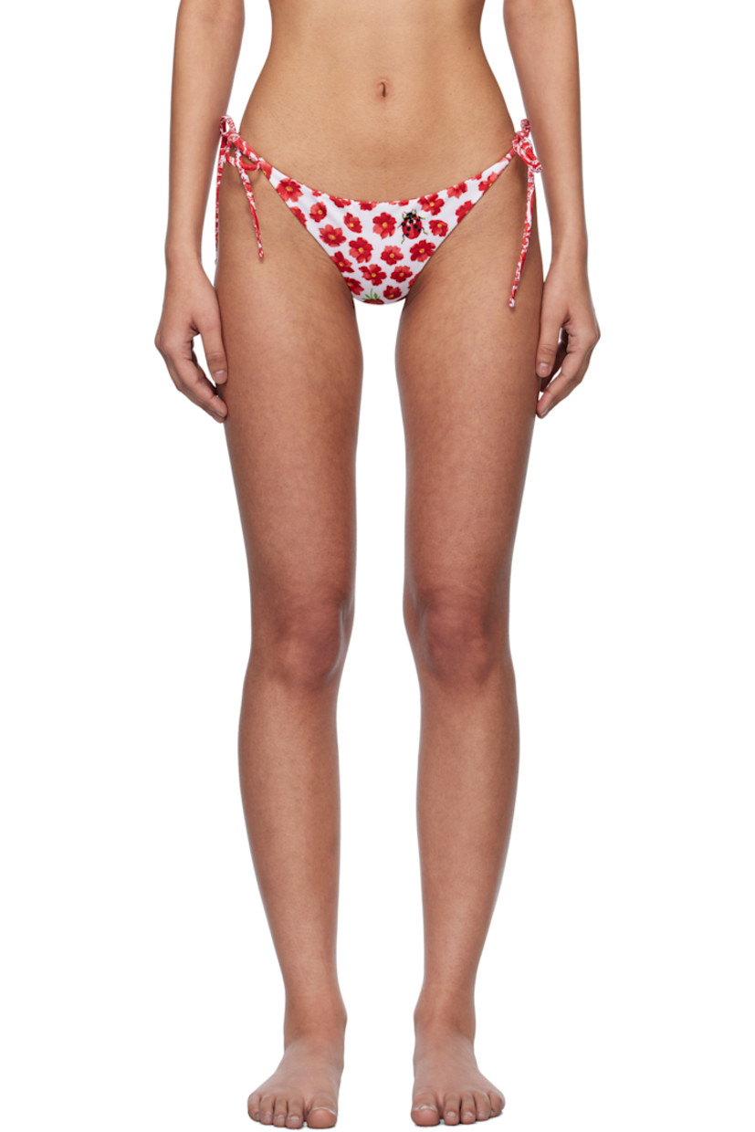 Stretch nylon jersey bikini bottom. Graphic pattern printed throughout.

· Self-tie fastening at sides
· Fully lined

Supplier color: White/Red