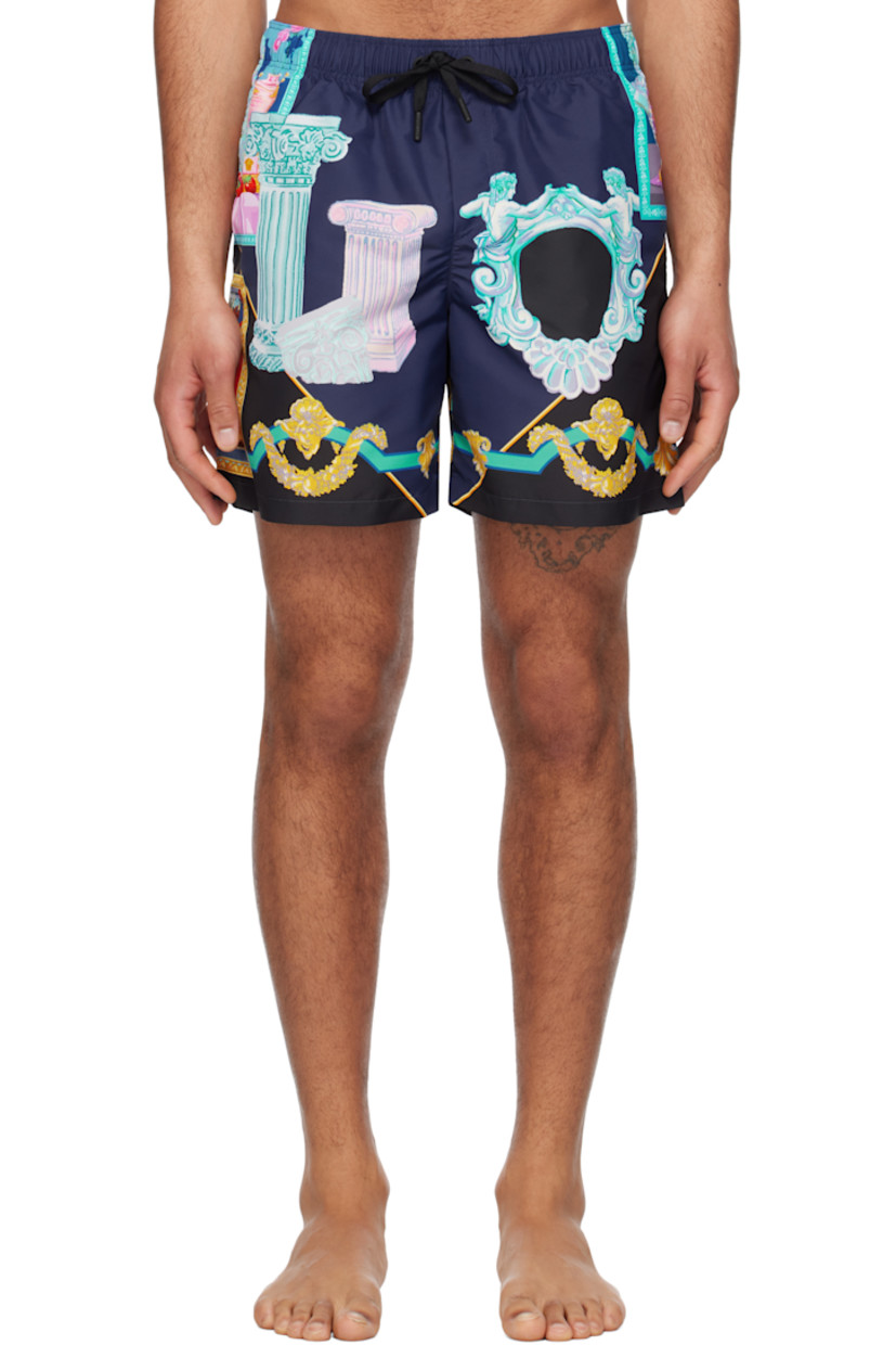 Polyester taffeta swim shorts. Logo graphic pattern printed throughout.

· Drawstring at elasticized waistband
· Three-pocket styling
· Mock fly
· Integrated brief-style mesh lining

Supplier color: Blue/Print
