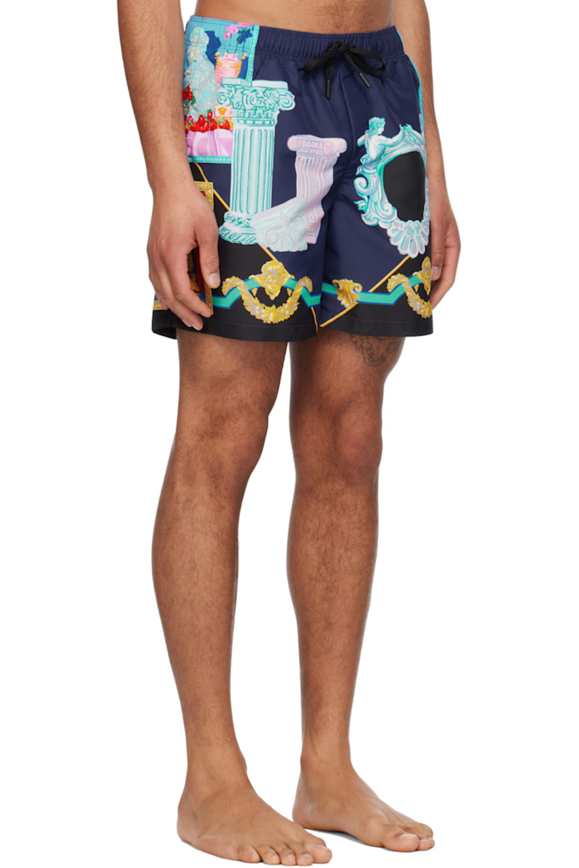 Polyester taffeta swim shorts. Logo graphic pattern printed throughout.

· Drawstring at elasticized waistband
· Three-pocket styling
· Mock fly
· Integrated brief-style mesh lining

Supplier color: Blue/Print