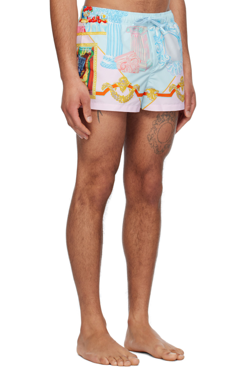 Polyester taffeta swim shorts. Graphic pattern printed throughout.

· Drawstring at elasticized waistband
· Three-pocket styling
· Mock fly
· Integrated brief-style mesh lining

Supplier color: Print