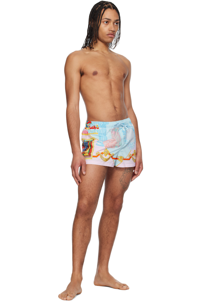 Polyester taffeta swim shorts. Graphic pattern printed throughout.

· Drawstring at elasticized waistband
· Three-pocket styling
· Mock fly
· Integrated brief-style mesh lining

Supplier color: Print