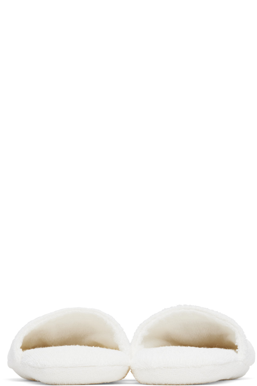 Cotton- and linen-blend terrycloth slippers in white and gold tone.

· Metallic thread detailing at vamp
· Signature Medusa embroidered at vamp
· Padded terrycloth footbed and sole

Supplier color: White/Gold