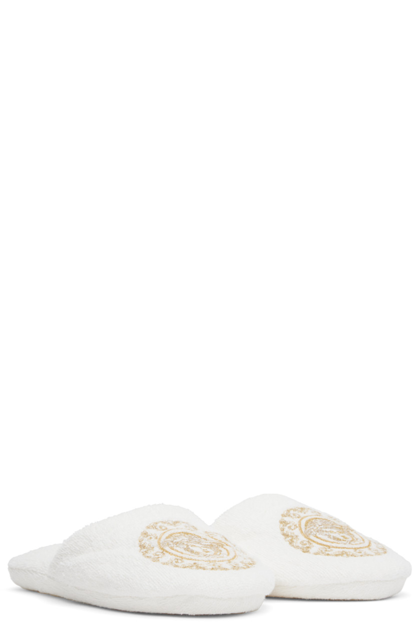 Cotton- and linen-blend terrycloth slippers in white and gold tone.

· Metallic thread detailing at vamp
· Signature Medusa embroidered at vamp
· Padded terrycloth footbed and sole

Supplier color: White/Gold