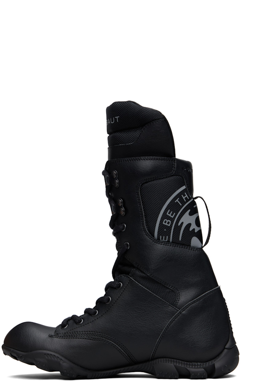 Calf-high grained faux-leather and canvas boots in black.

· Leap® Beyond Leather
· Lace-up closure
· Logo-printed extended padded tongue
· Padded collar
· Rubber logo patch at outer side
· Logo embossed at heel tab
· Pull-loop at graphic-printed heel counter
· Logo-embossed heel midsole
· Treaded rubber sole

Supplier color: Black