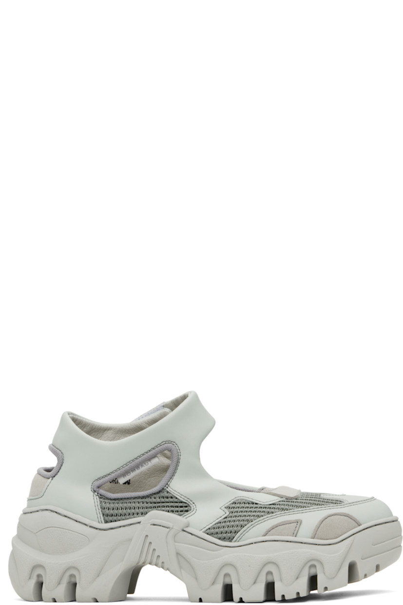 Handcrafted low-top buffed faux-leather Mary Jane-style sneakers in blue.

· Cutouts throughout
· Velcro strap at vamp
· Mesh and faux-nubuck lining
· Treaded rubber platform sole
· Platform: H2"

Supplier color: Medic
