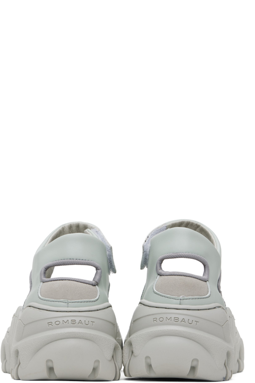 Handcrafted low-top buffed faux-leather Mary Jane-style sneakers in blue.

· Cutouts throughout
· Velcro strap at vamp
· Mesh and faux-nubuck lining
· Treaded rubber platform sole
· Platform: H2"

Supplier color: Medic