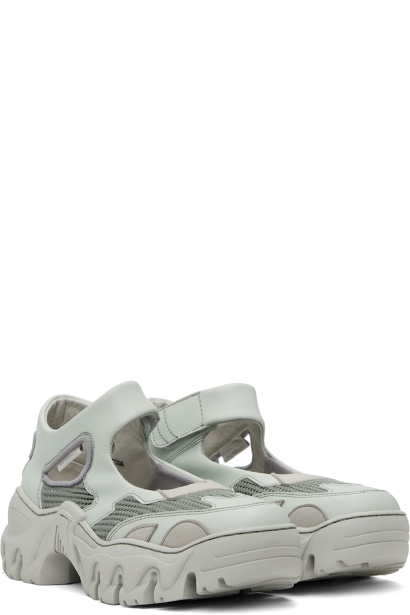 Handcrafted low-top buffed faux-leather Mary Jane-style sneakers in blue.

· Cutouts throughout
· Velcro strap at vamp
· Mesh and faux-nubuck lining
· Treaded rubber platform sole
· Platform: H2"

Supplier color: Medic