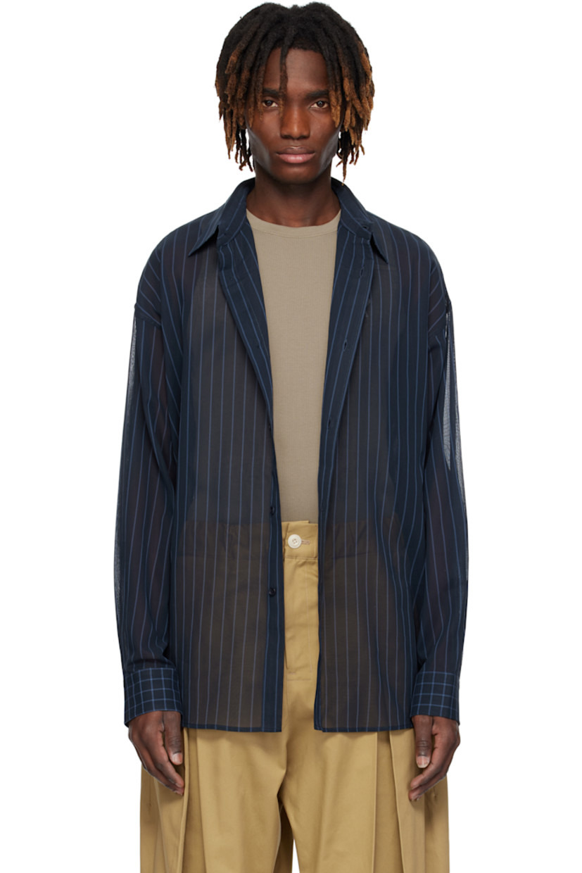 Sheer nylon chiffon shirt. Stripe and check pattern throughout.

· Paneled construction 
· Spread collar
· Button closure
· Shirttail hem
· Dropped shoulders
· Pleated buttoned barrel cuffs
· Box pleat at yoke

Supplier color: Navy/Cornflower blue