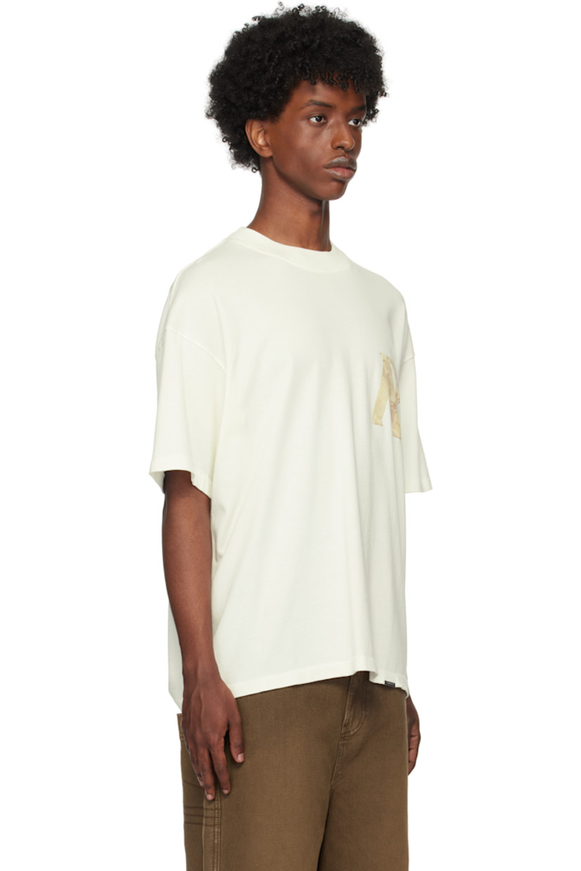 Cotton jersey T-shirt. 

· Rib-knit crewneck
· Logo graphic at front and back 
· Logo hardware at hem 
· Dropped shoulders

Supplier color: Flat white