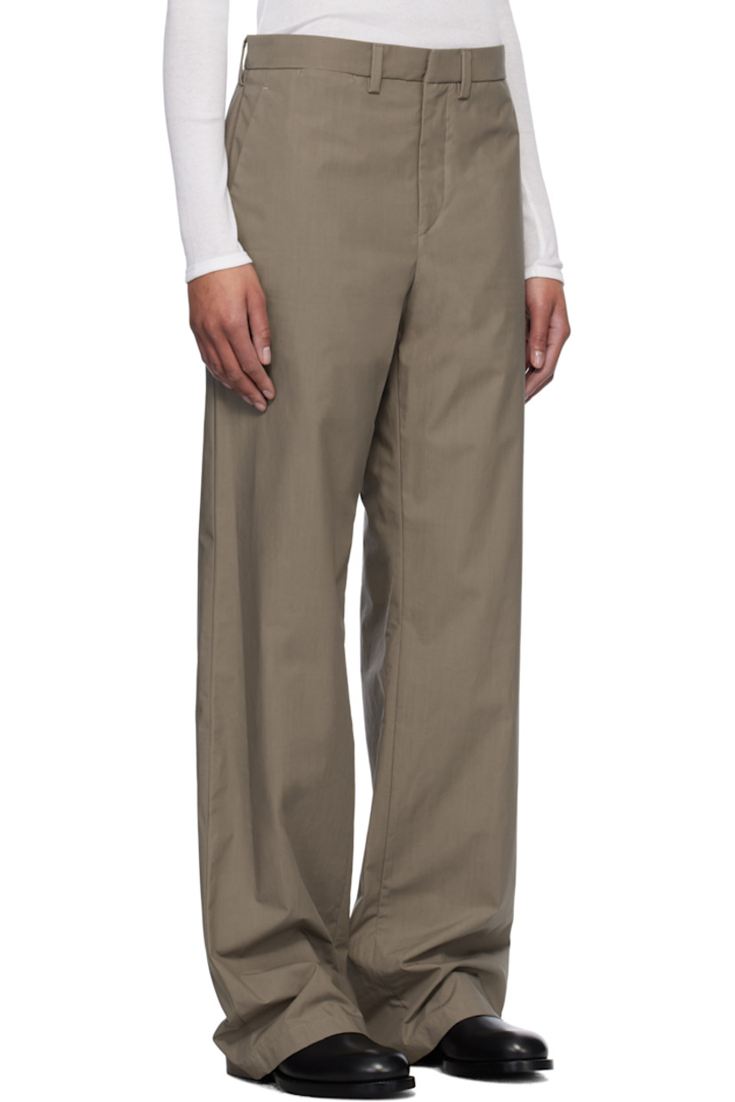 Waxed cotton poplin trousers.

· Belt loops
· Three-pocket styling
· Zip fly

Supplier color: Argile waxed