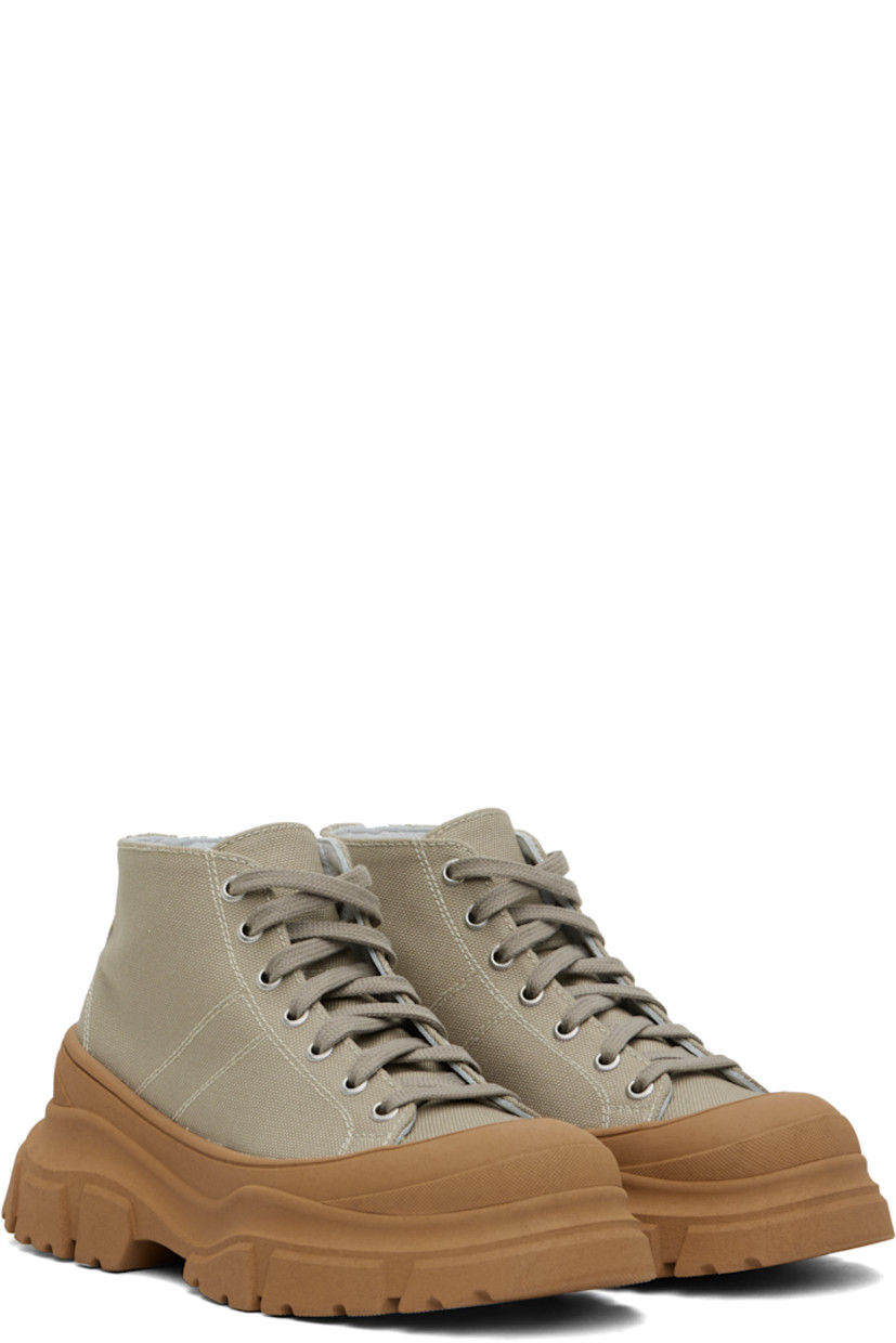 High-top canvas sneakers in taupe and tan.

· Rubber cap toe
· Lace-up closure
· Grained leather lining
· Lugged rubber platform sole
· Contrast stitching in white
· Platform: H2"

Supplier color: Cord/Tan