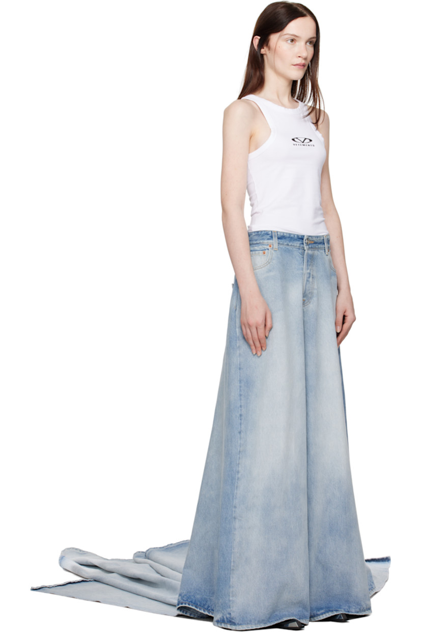 Non-stretch denim jeans. Non-stretch denim overlay with train at back.

· Fading throughout
· Belt loops at layered waistband
· Seven-pocket styling
· Button-fly
· Logo patch at back waistband
· Logo-engraved silver-tone hardware
· Contrast stitching in yellow

Supplier color: Light blue