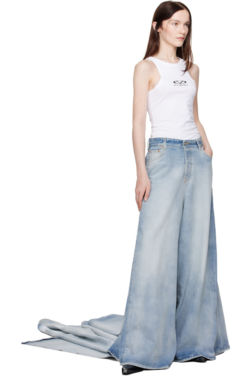 Non-stretch denim jeans. Non-stretch denim overlay with train at back.

· Fading throughout
· Belt loops at layered waistband
· Seven-pocket styling
· Button-fly
· Logo patch at back waistband
· Logo-engraved silver-tone hardware
· Contrast stitching in yellow

Supplier color: Light blue