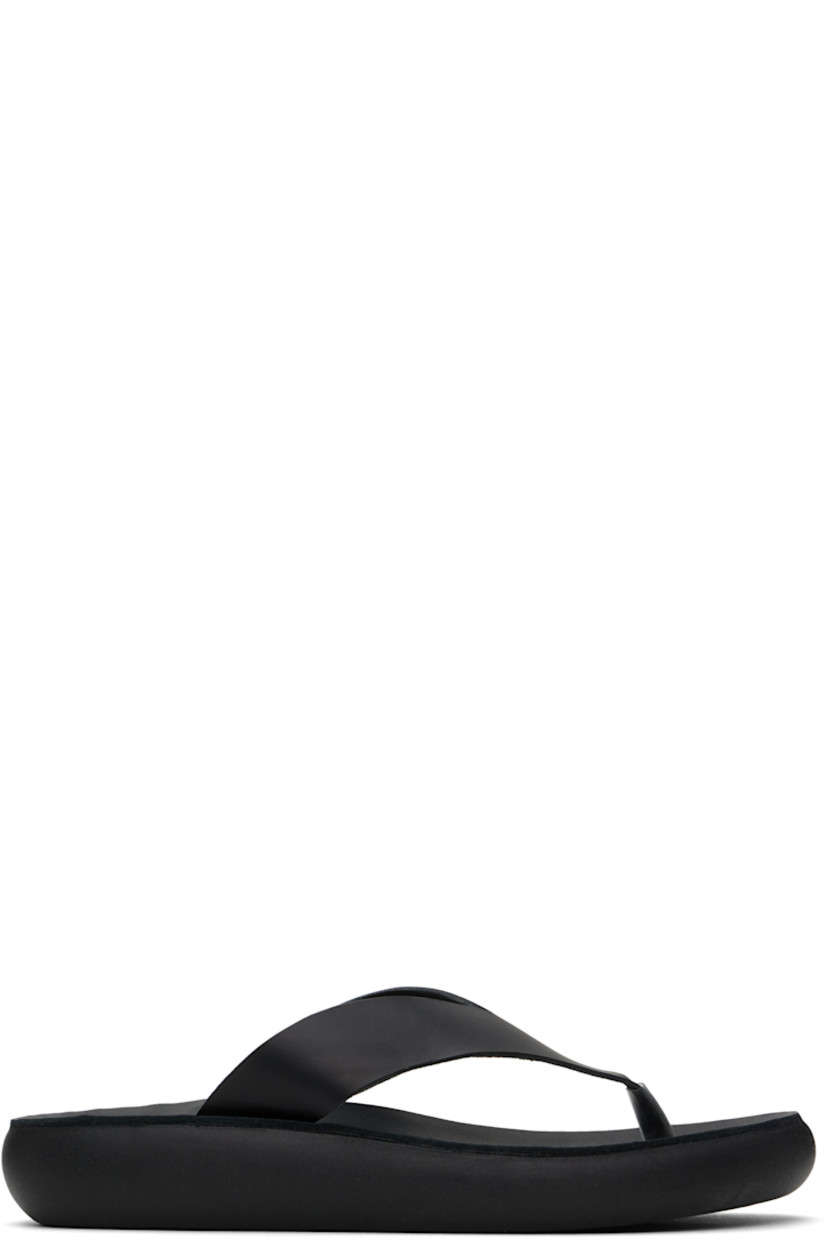 Handcrafted chemical-free buffed leather flip-flops in black.

· Open toe
· Thong-style strap at vamp
· Logo embossed at molded footbed
· Treaded rubber sole

Supplier color: Black