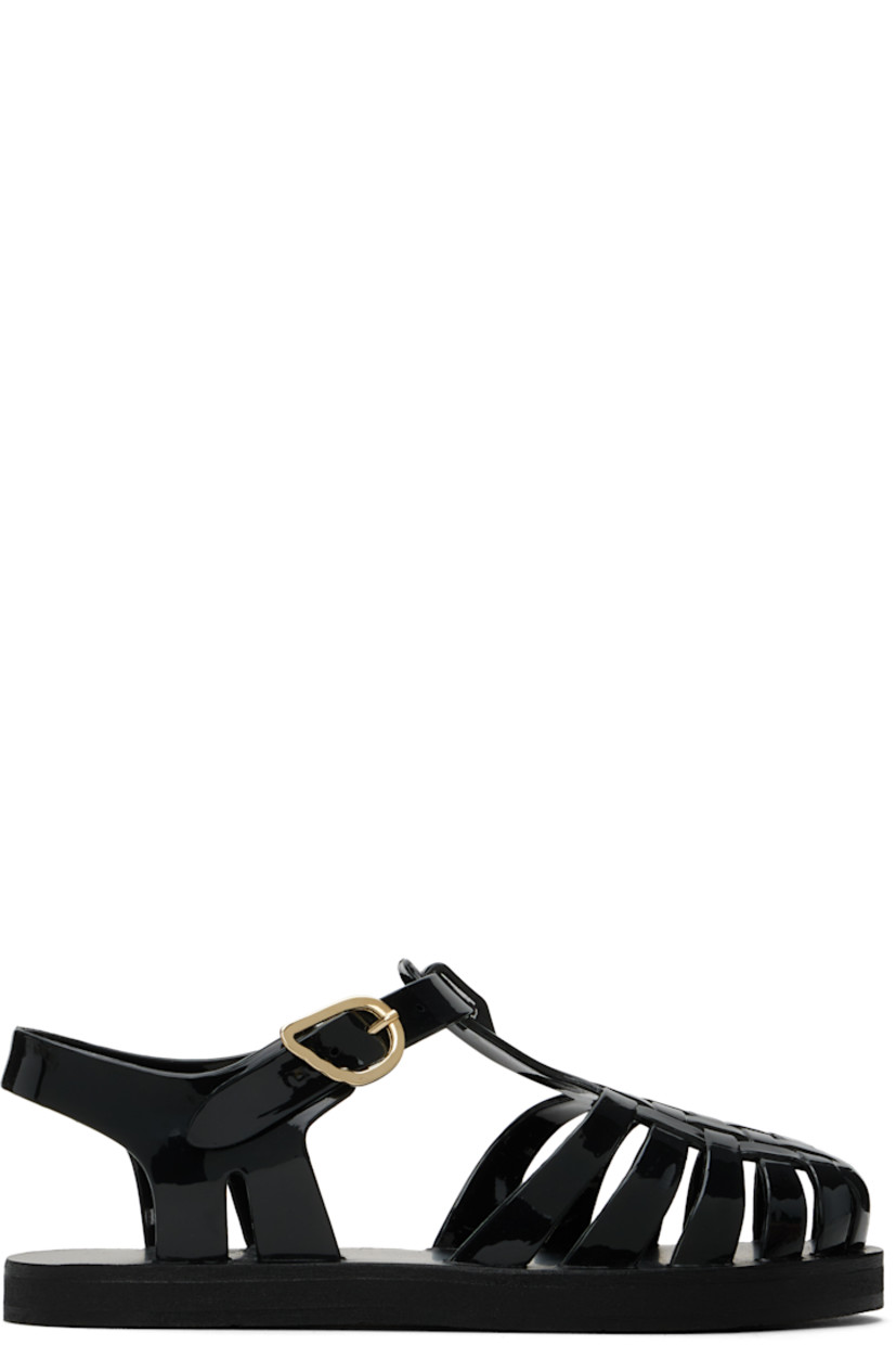 Handcrafted vinyl sandals in black.

· Cutouts throughout
· Pin-buckle ankle strap
· Logo embossed at footbed
· Treaded rubber sole

Supplier color: Black
