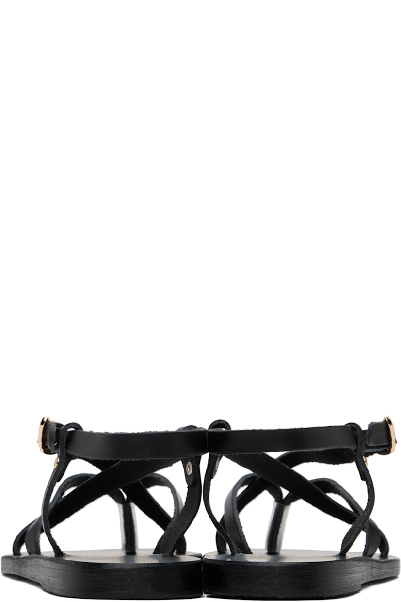 Handcrafted buffed leather flat sandals in black.

· Open toe
· Thong-style strap
· Criss-crossing straps at vamp
· Pin-buckle ankle strap 
· Logo embossed at padded leather footbed
· Textured rubber heel
· Leather sole

Supplier color: Black