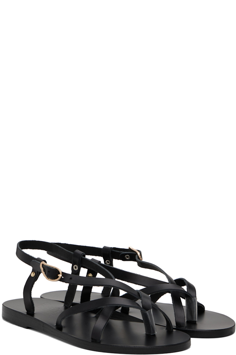 Handcrafted buffed leather flat sandals in black.

· Open toe
· Thong-style strap
· Criss-crossing straps at vamp
· Pin-buckle ankle strap 
· Logo embossed at padded leather footbed
· Textured rubber heel
· Leather sole

Supplier color: Black