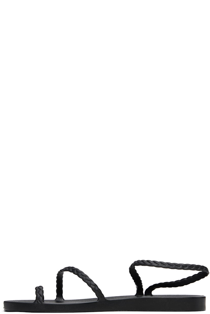 Handcrafted rubber flat sandals in black.

· Braided detailing throughout
· Fixed toe strap
· Fixed ankle strap
· Logo embossed at rubber footbed
· Textured rubber heel
· Rubber sole

Supplier color: Black