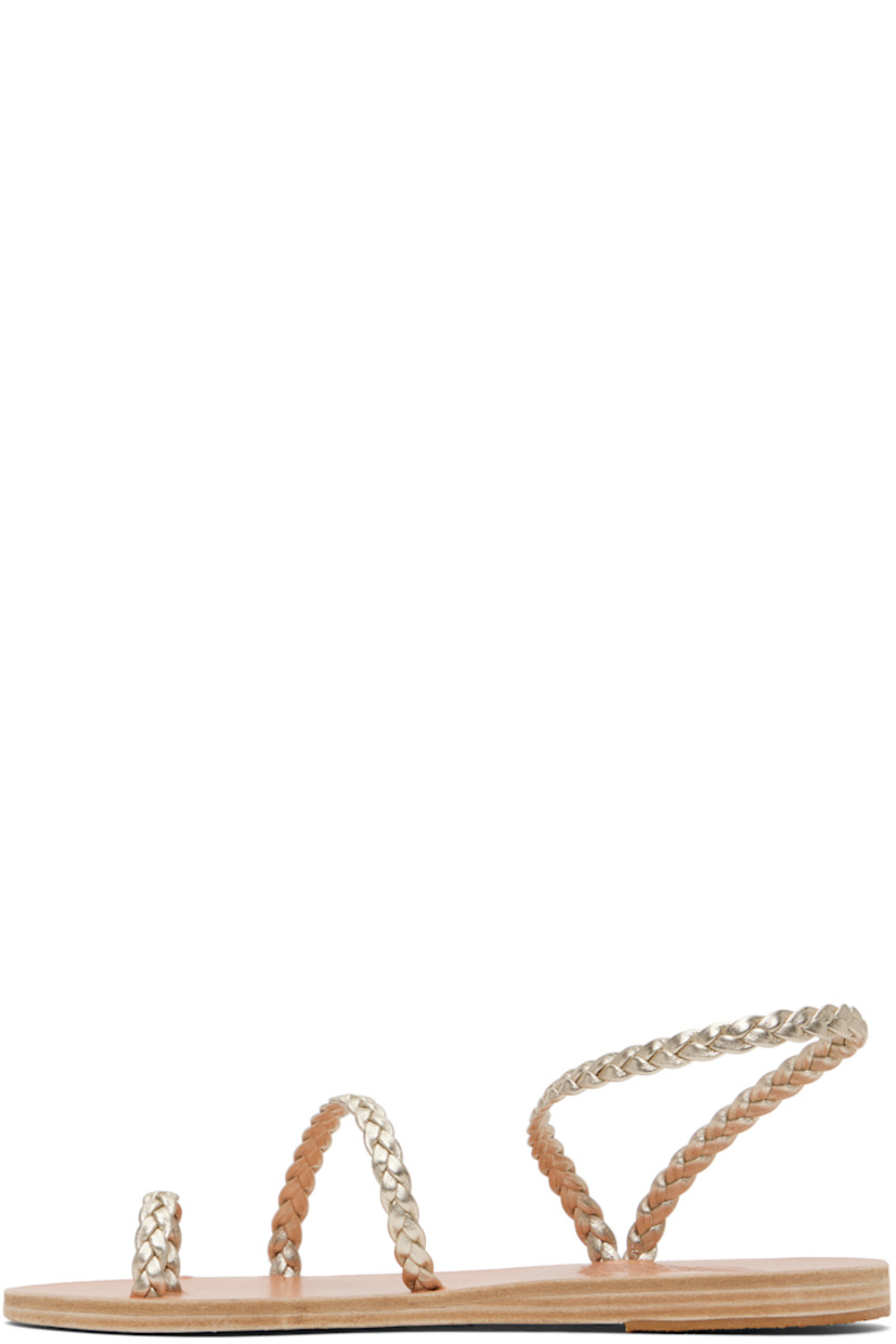 Handcrafted braided nappa leather flat sandals in silver tone.

· Open toe
· Fixed toe strap
· Fixed ankle strap
· Logo embossed at leather footbed
· Textured rubber heel
· Stacked leather sole

Supplier color: Platinum